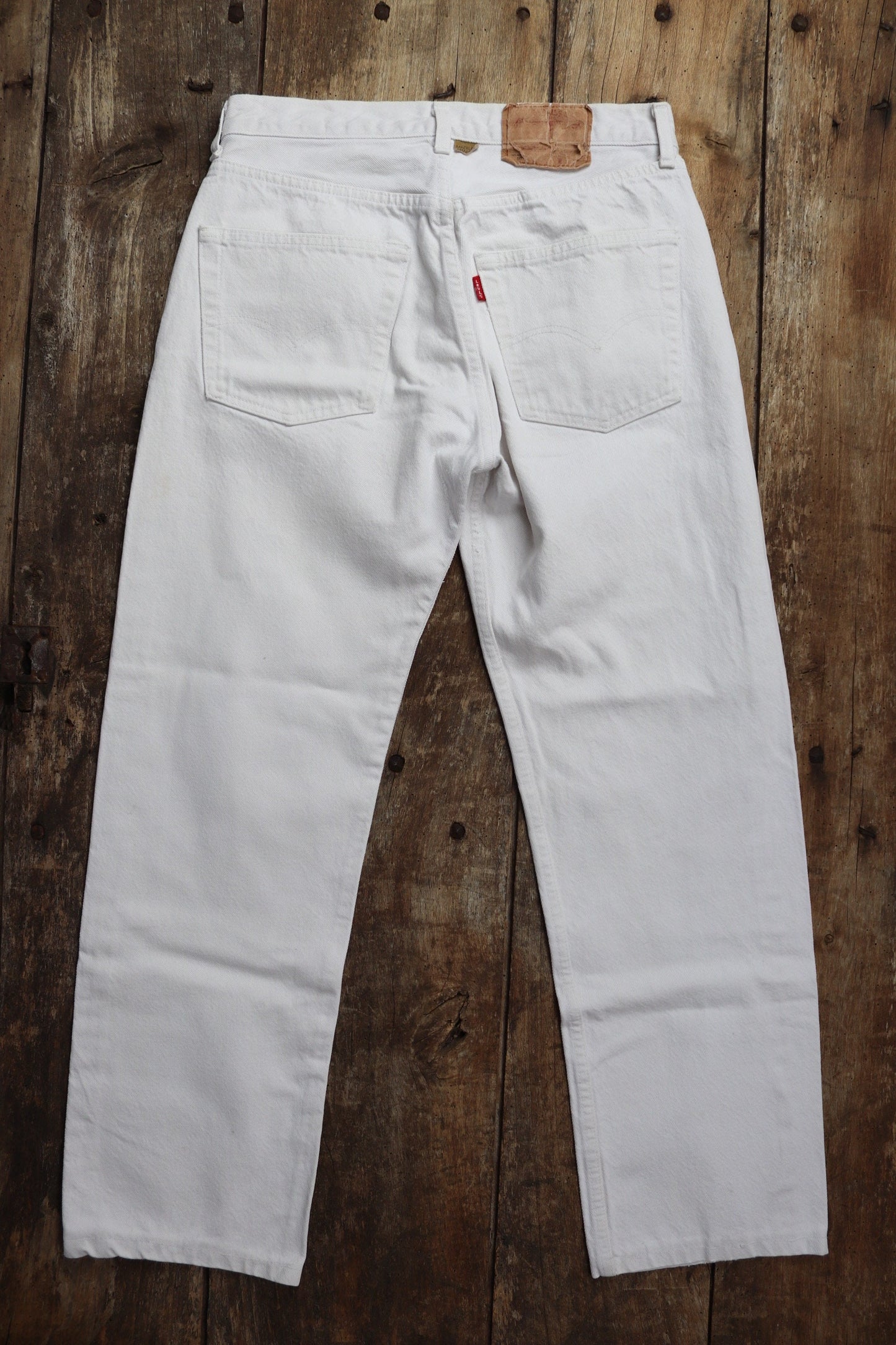 Vintage 1990s 90s Levis 501 Levi Strauss white red tab small e denim jeans button fly 29” x 28” made in France mod