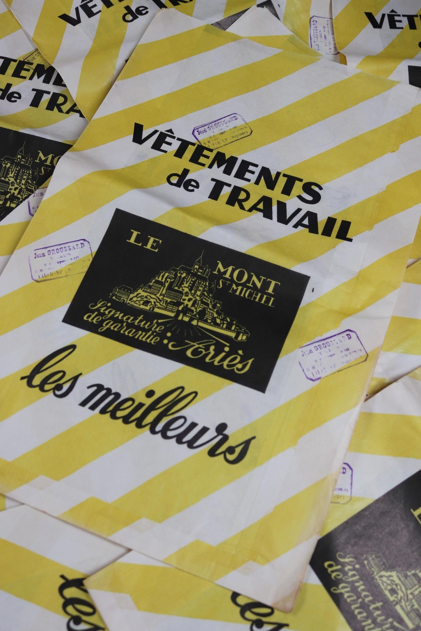 Vintage 1950s French paper print art Le Mont St Michel yellow white striped bag advertising stamped workwear work chore display collectible