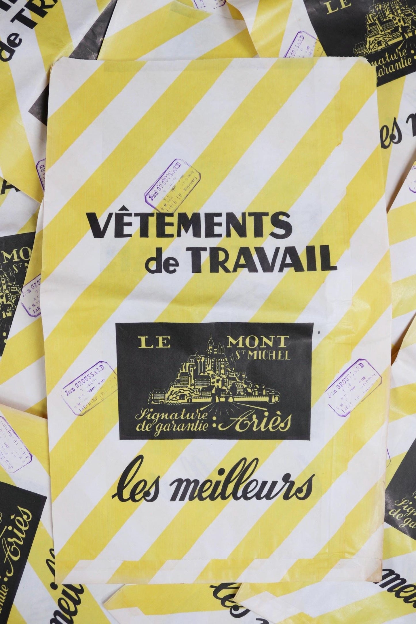 Vintage 1950s French paper print art Le Mont St Michel yellow white striped bag advertising stamped workwear work chore display collectible