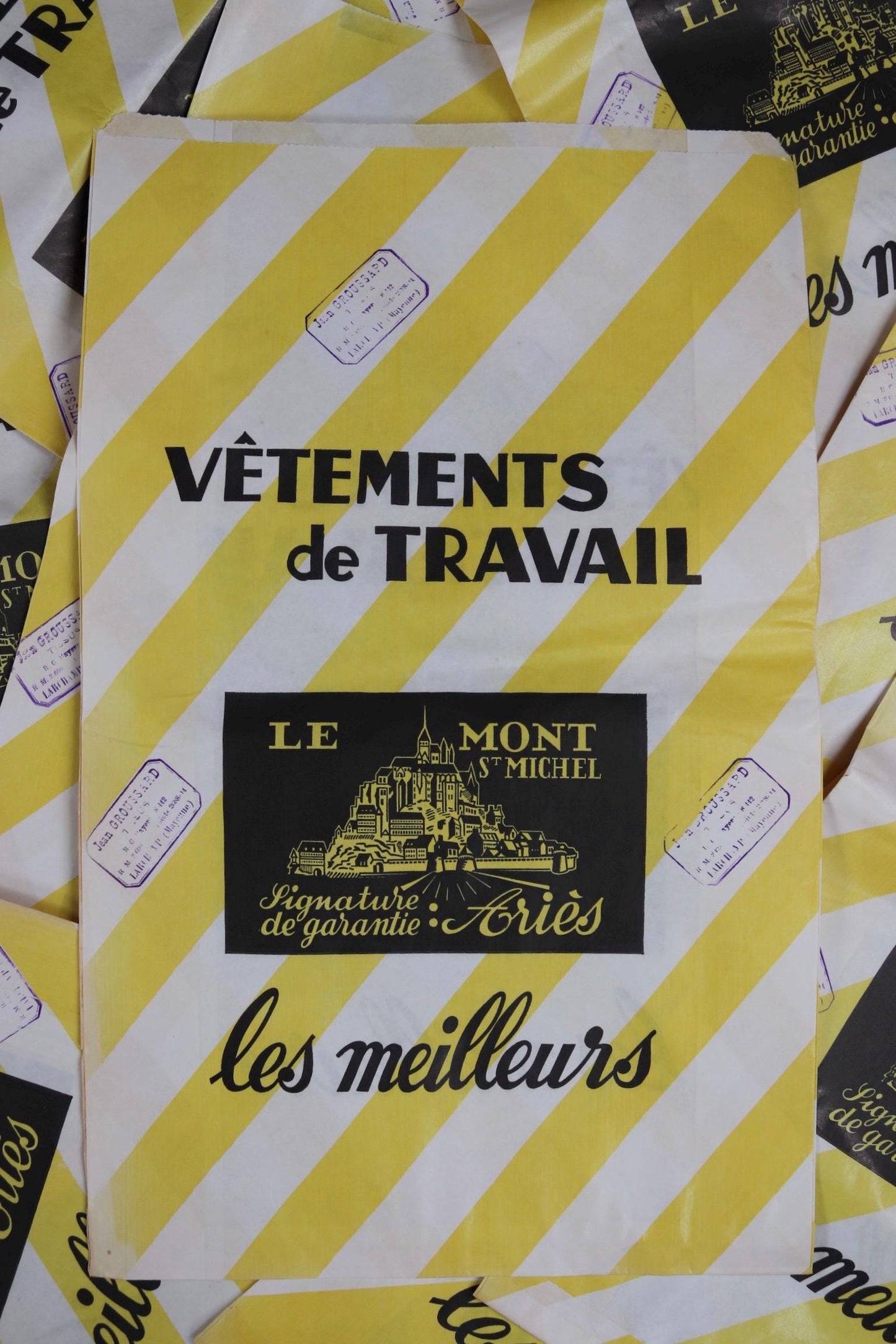 Vintage 1950s French paper print art Le Mont St Michel yellow white striped bag advertising stamped workwear work chore display collectible
