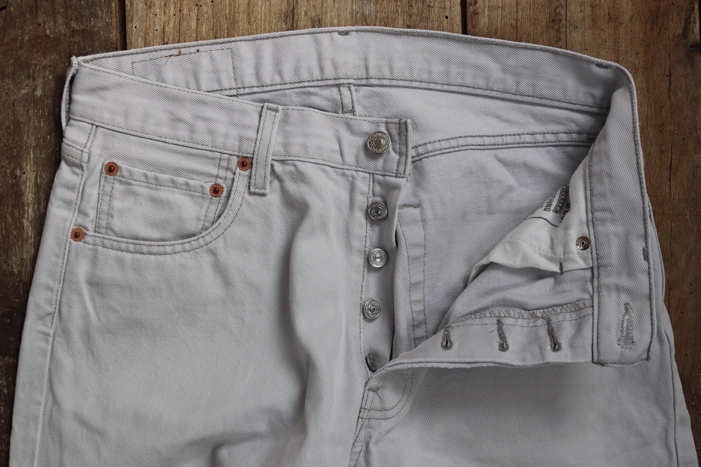 Vintage 1990s 90s Levis 517 Levi Strauss off white grey red tab small e denim jeans button fly 31” x 28” mod