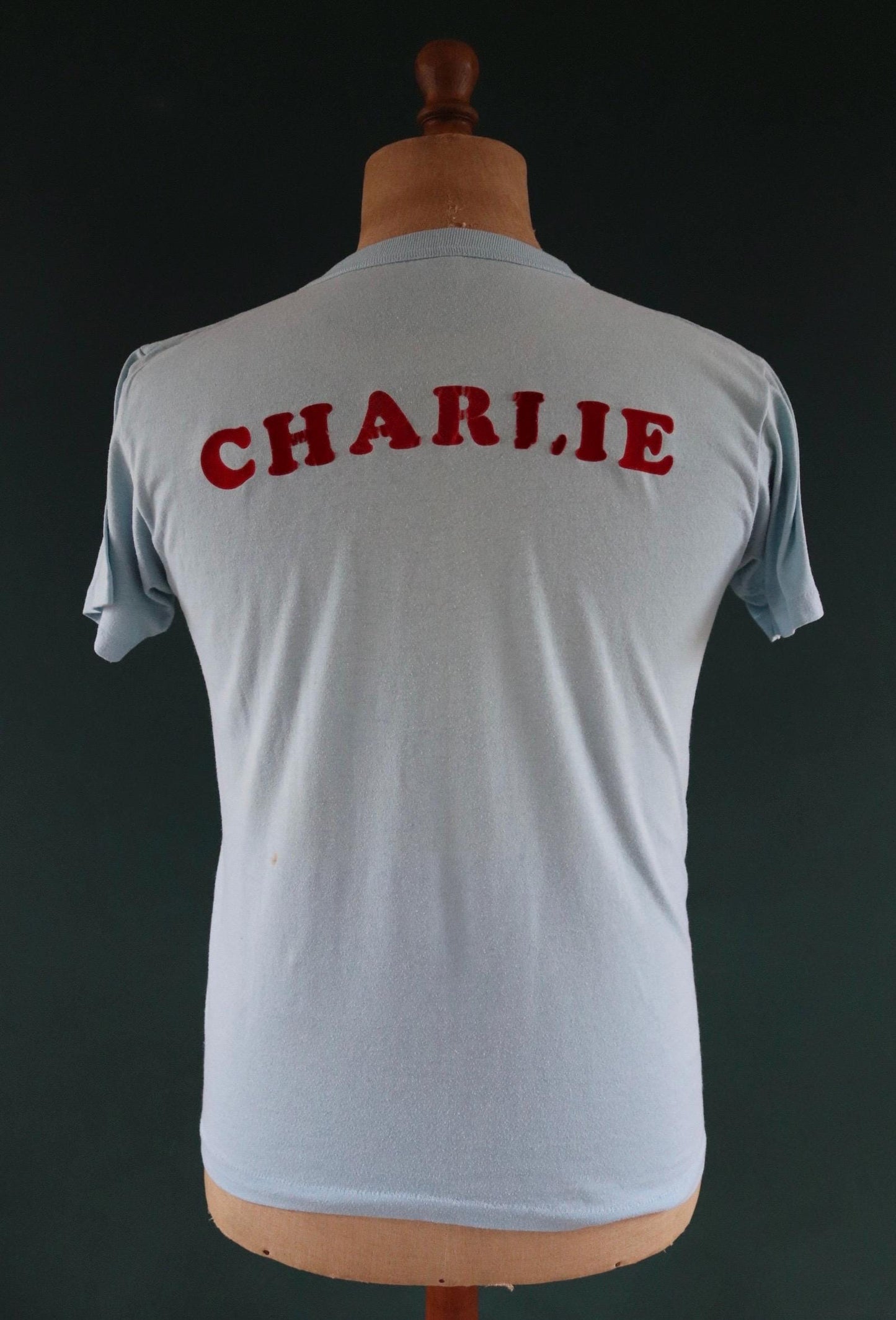 Vintage 1970s 70s 1980s 80s sky blue poly cotton 50th birthday souvenir Charlie over the hill sports sportswear t shirt 38” chest