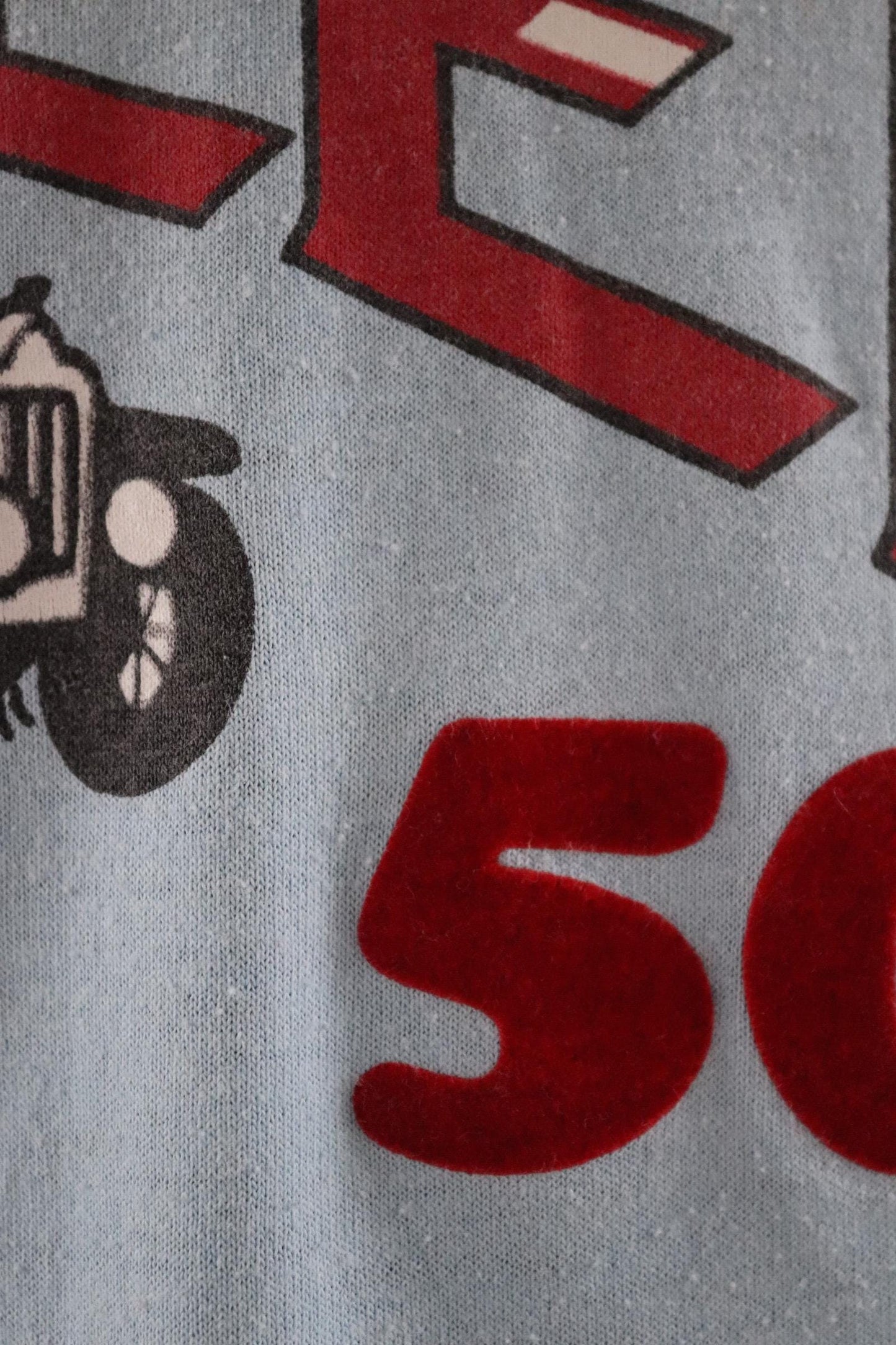 Vintage 1970s 70s 1980s 80s sky blue poly cotton 50th birthday souvenir Charlie over the hill sports sportswear t shirt 38” chest