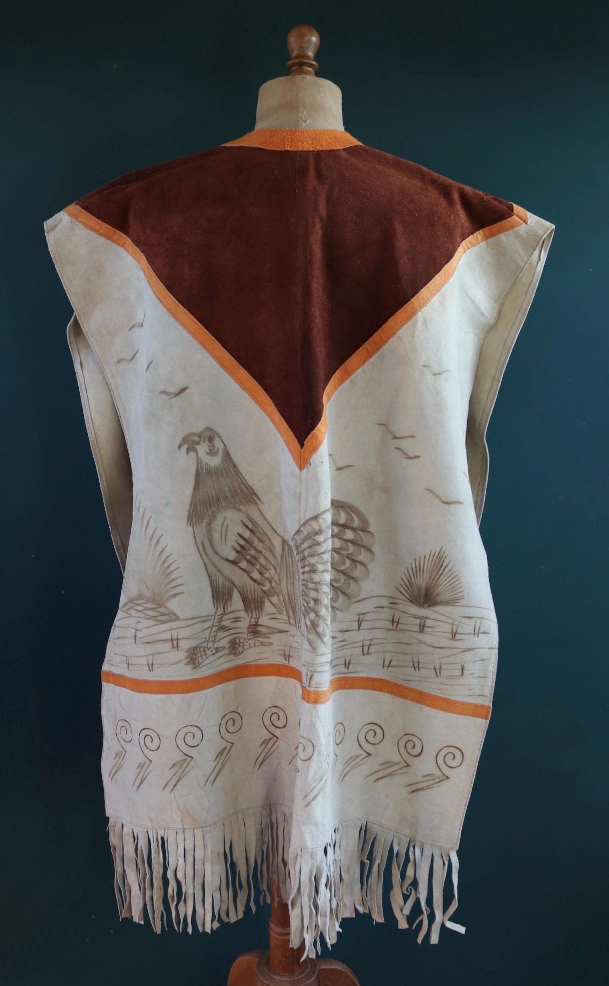 Vintage 1960s 1970s suede poncho orange brown tasseled cow hide vest waistcoat South Western souvenir biker tabard gilet decorated