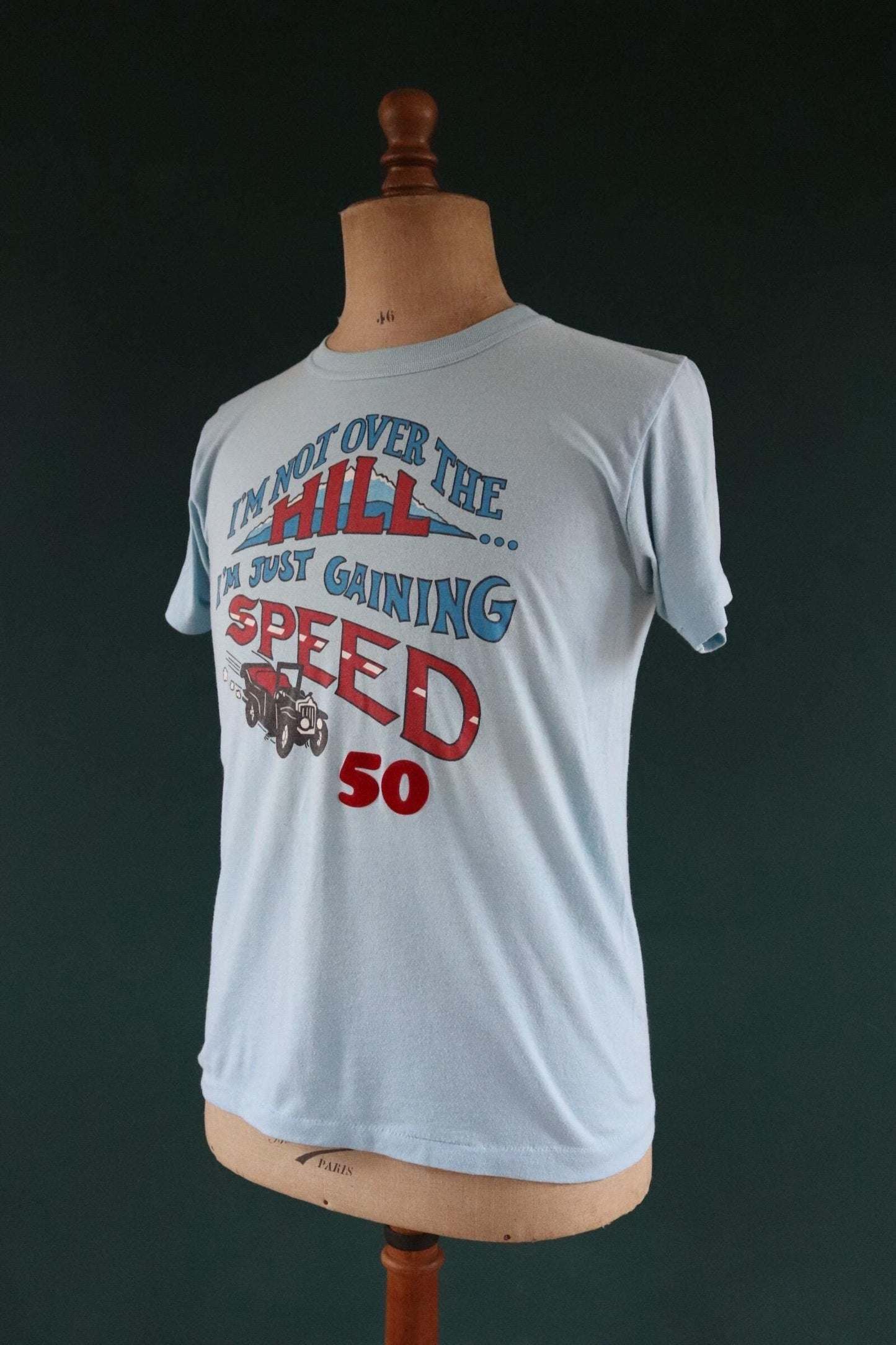 Vintage 1970s 70s 1980s 80s sky blue poly cotton 50th birthday souvenir Charlie over the hill sports sportswear t shirt 38” chest