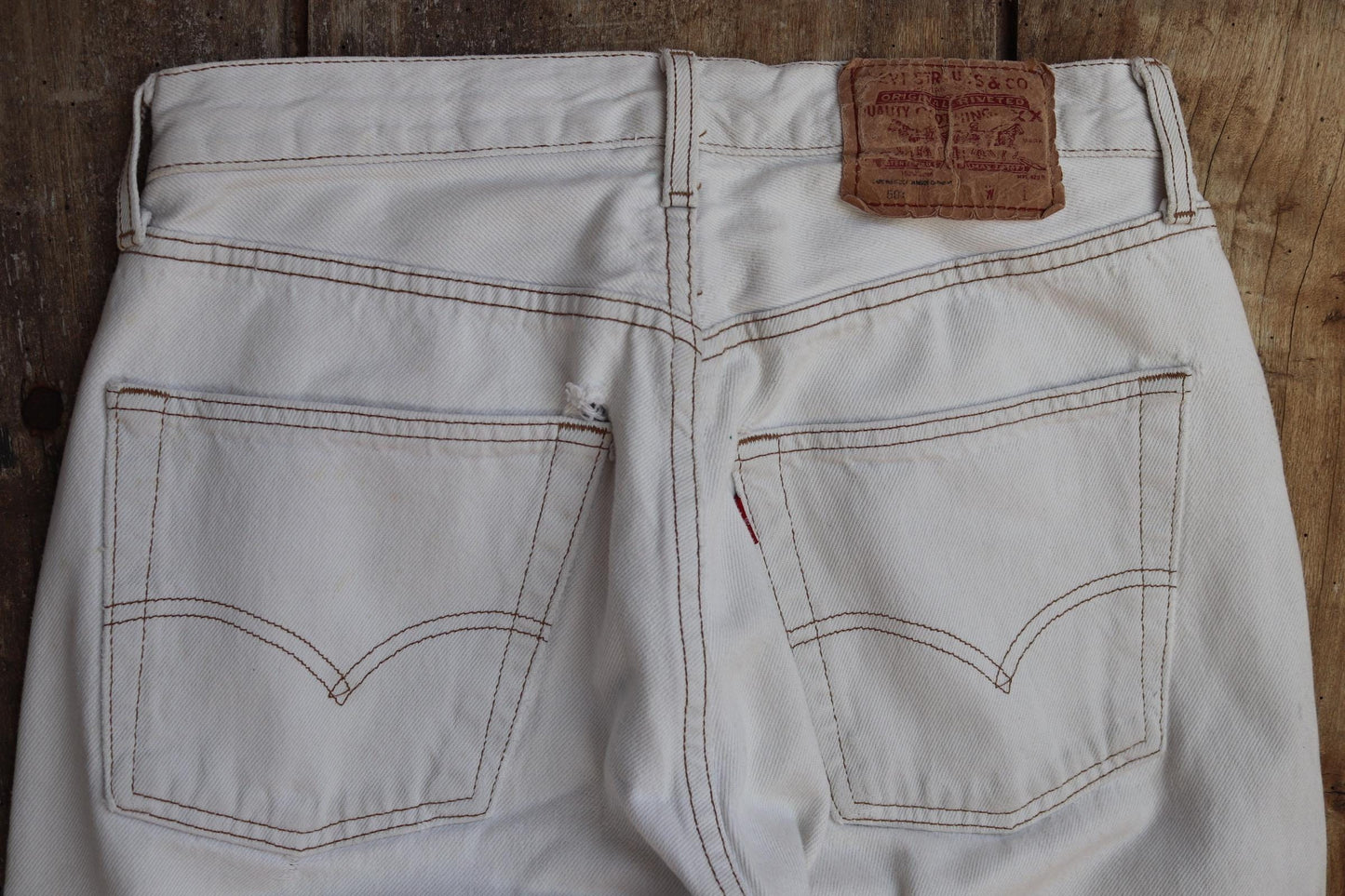 Vintage 1990s white denim Levis 501 jeans - Levi Strauss red tab - small e - 27” x 30”