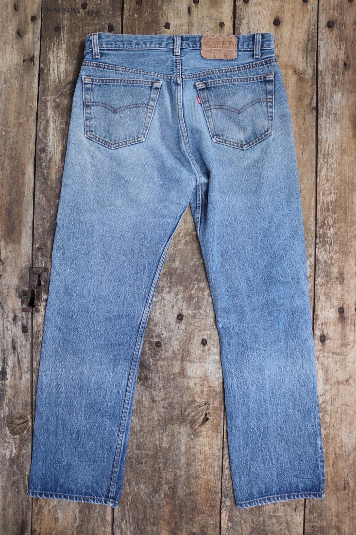 Vintage 1980s Levis 501 denim jeans - made in USA - small e red tab - 32” x 30”