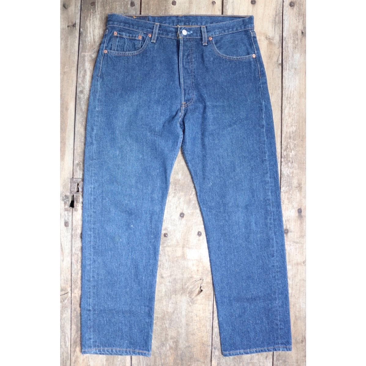 Vintage 1990s Levis 501xx denim jeans - made in USA - small e red