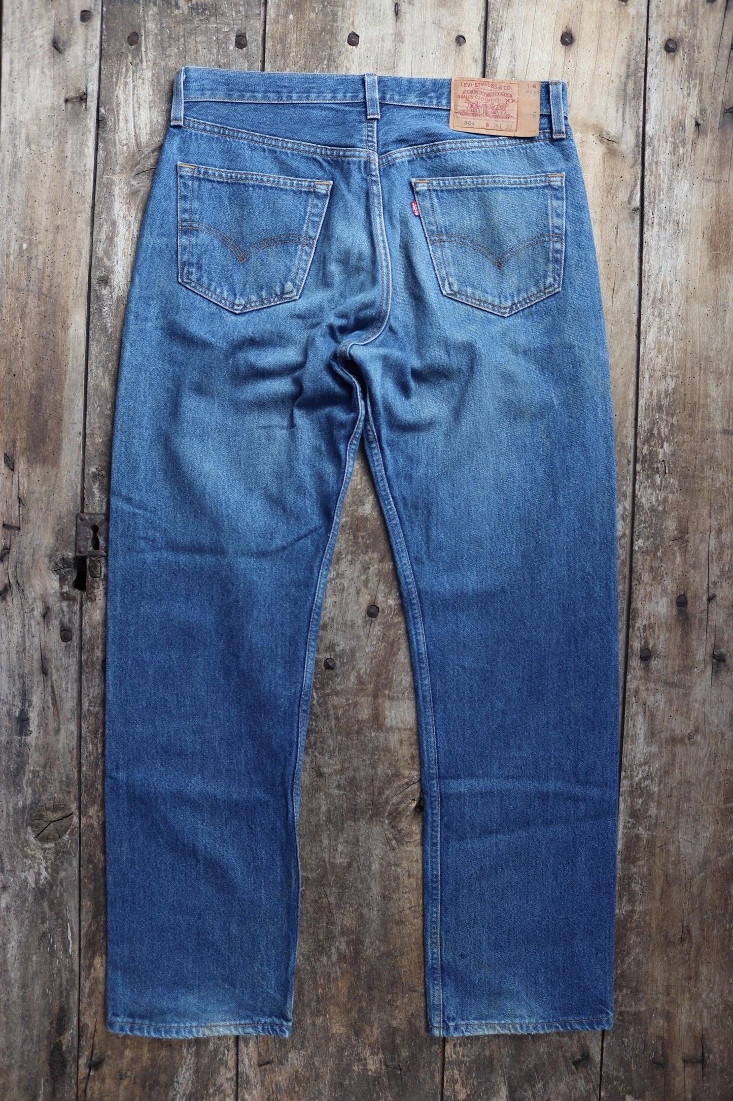 Vintage 1990s Levis 501 denim jeans - made in USA - small e red tab - 33” x 32”