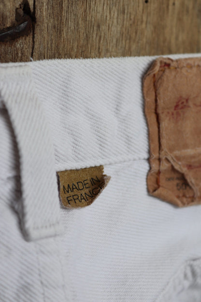 Vintage 1990s 90s Levis 501 Levi Strauss white red tab small e denim jeans button fly 29” x 28” made in France mod