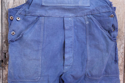 Vintage French workwear overalls - Le Mont St Michel dungarees - 1950s sun faded blue cotton twill - 42” x 26” - darned and repaired