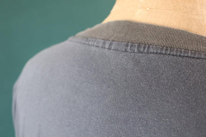 Vintage 1990s oversized t shirt - Calgary Canada - cow skull design - faded black - 48” chest