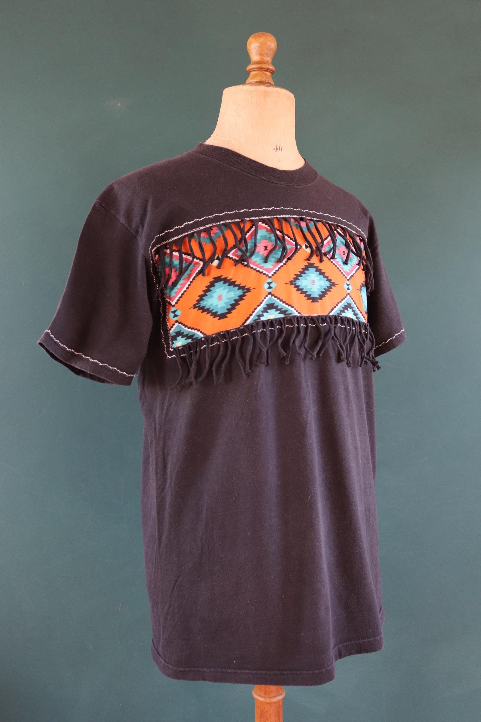 Vintage 1990s faded black t shirt - Aztec style design with tassels - 43” chest