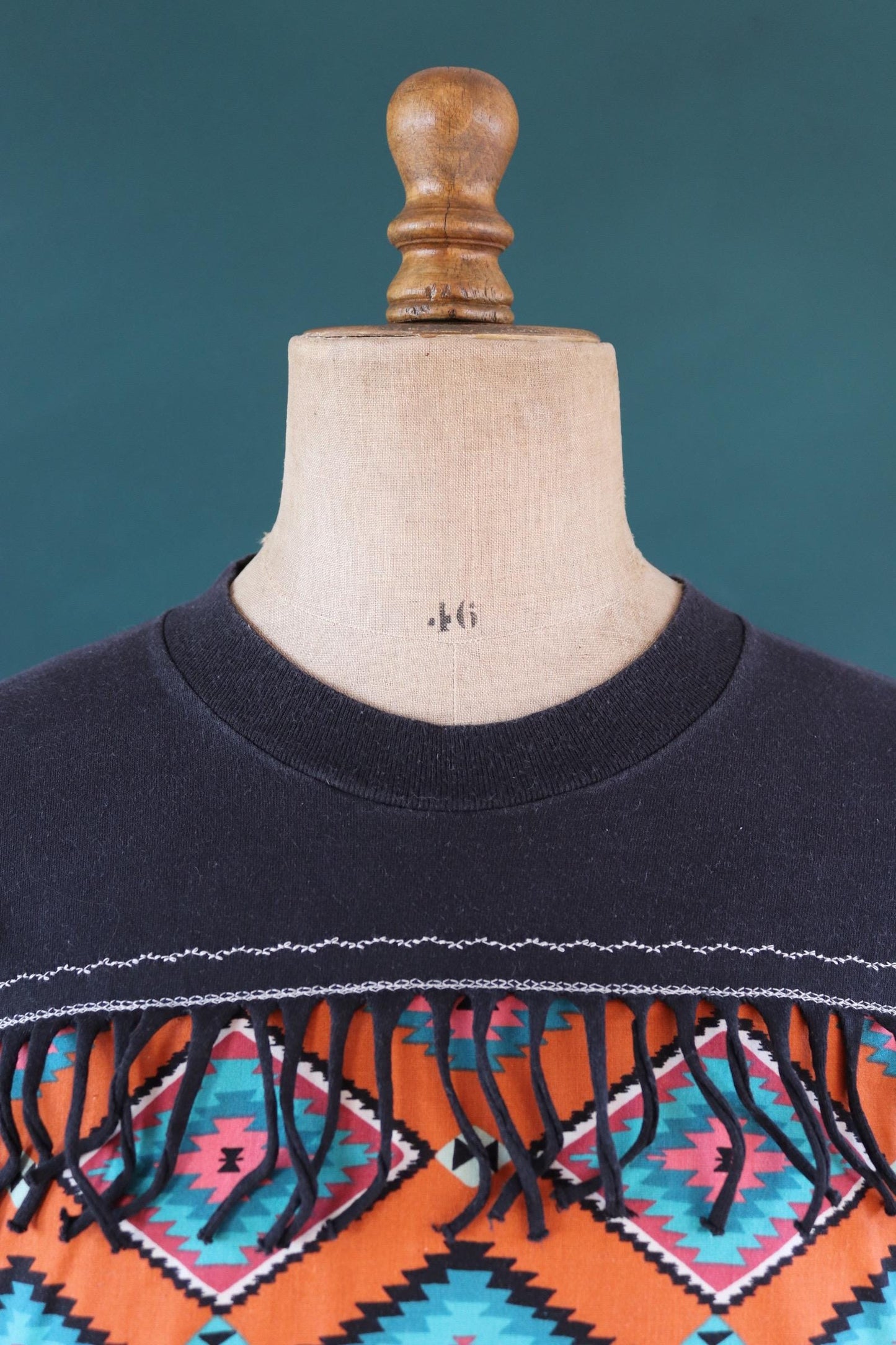 Vintage 1990s faded black t shirt - Aztec style design with tassels - 43” chest