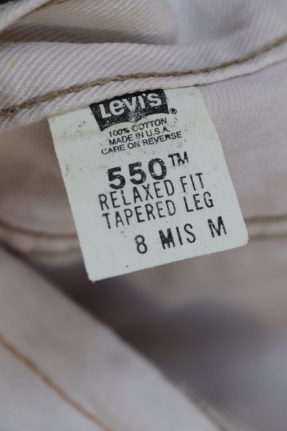 Vintage 1990s Levis 550 white denim jeans - Levi Strauss red tab - barrel leg - small e - zip fly - 29” x 38”