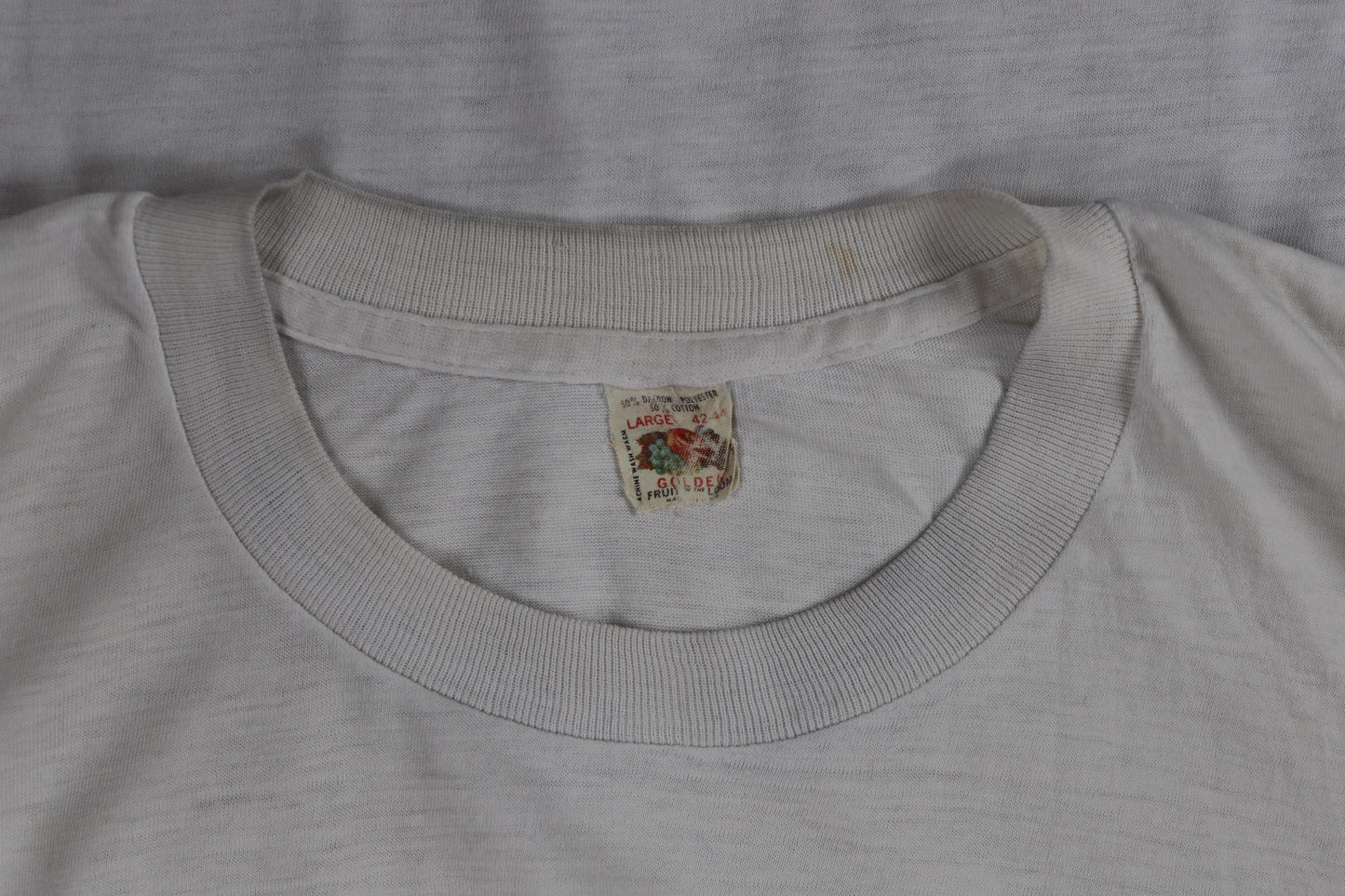 Vintage 1970s Fruit of the loom white t shirt - thrashed tee - coat of arms print - 40” chest