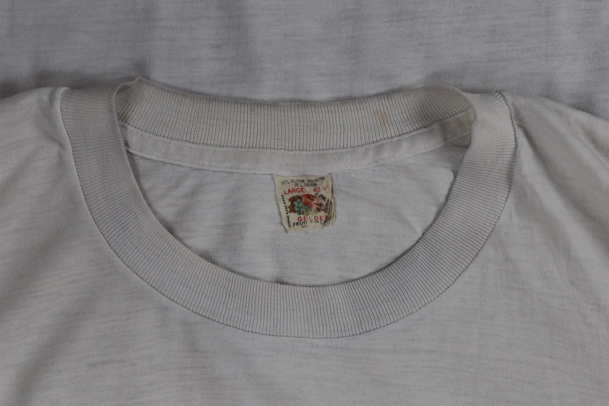Vintage 1970s Fruit of the loom white t shirt - thrashed tee - coat of arms print - 40” chest