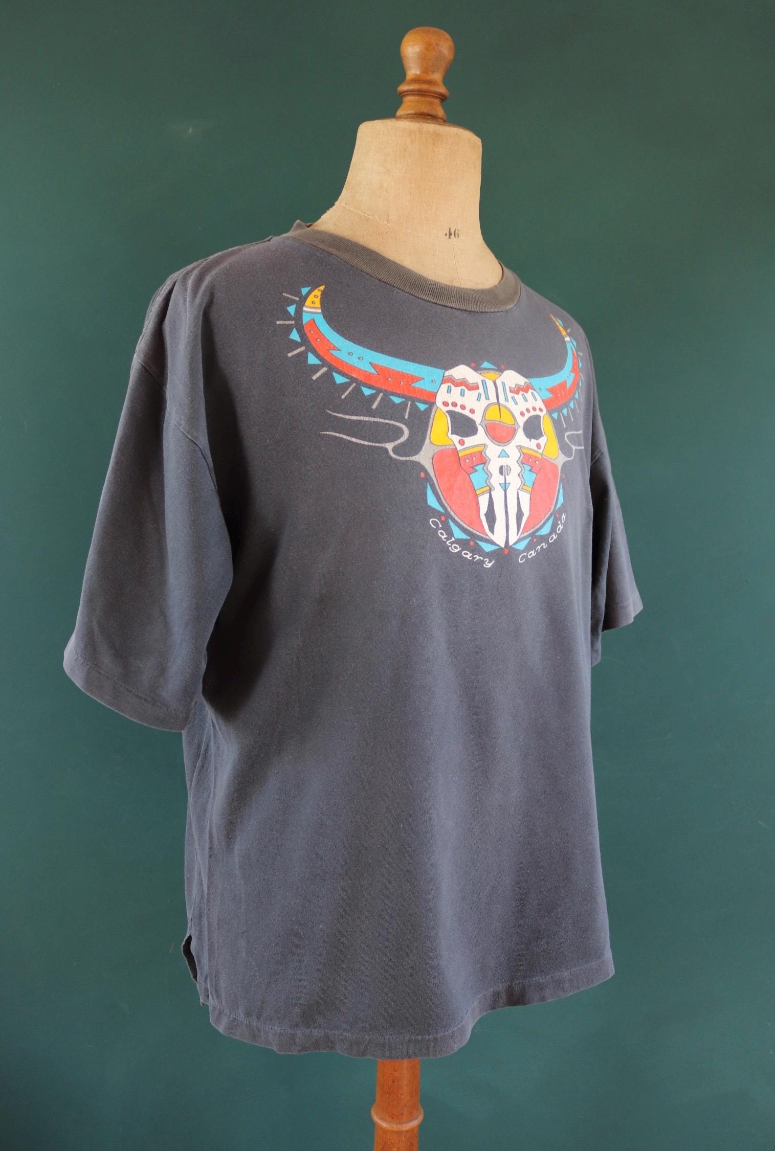Vintage 1990s oversized t shirt - Calgary Canada - cow skull design - faded black - 48” chest