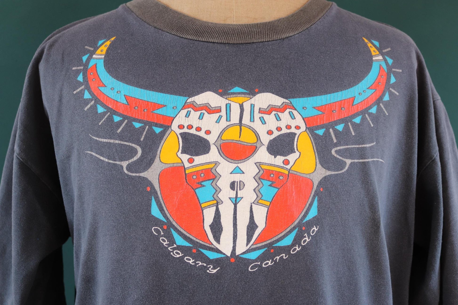 Vintage 1990s oversized t shirt - Calgary Canada - cow skull design - faded black - 48” chest