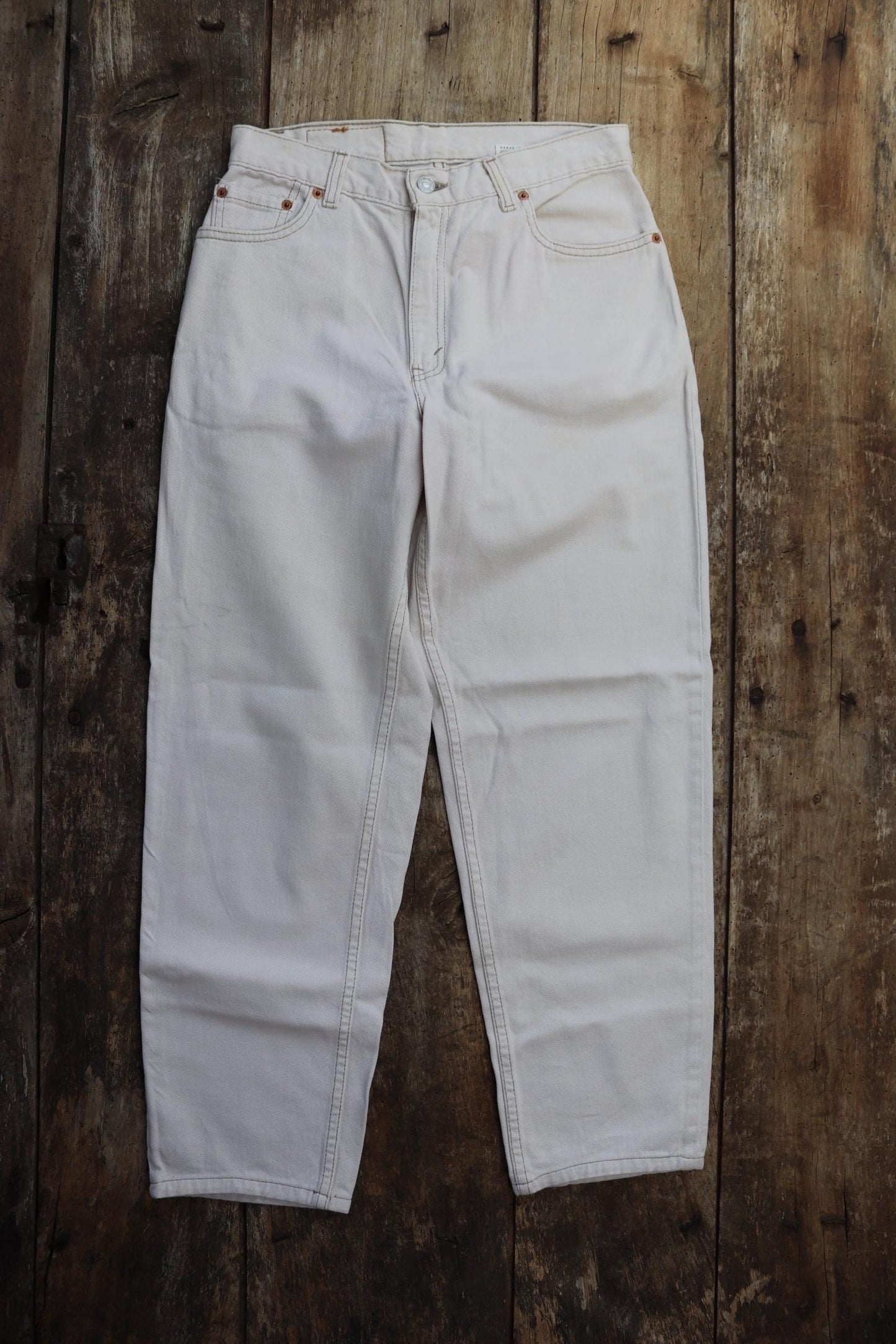 Vintage 1990s Levis 550 white denim jeans - Levi Strauss red tab - barrel leg - small e - zip fly - 29” x 38”