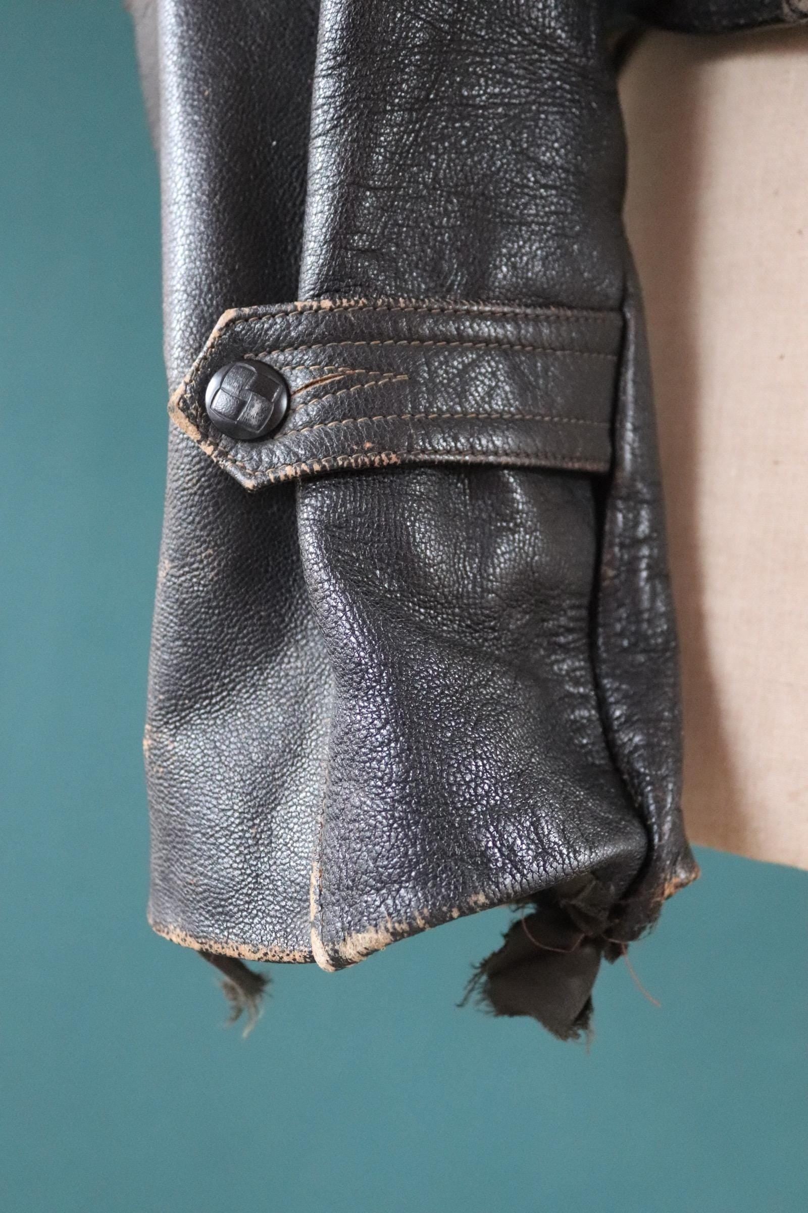 Vintage 1950s Italian black cropped leather jacket - motorcycle blouson - half belt - 45” chest