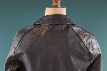 Vintage 1950s Italian black cropped leather jacket - motorcycle blouson - half belt - 45” chest