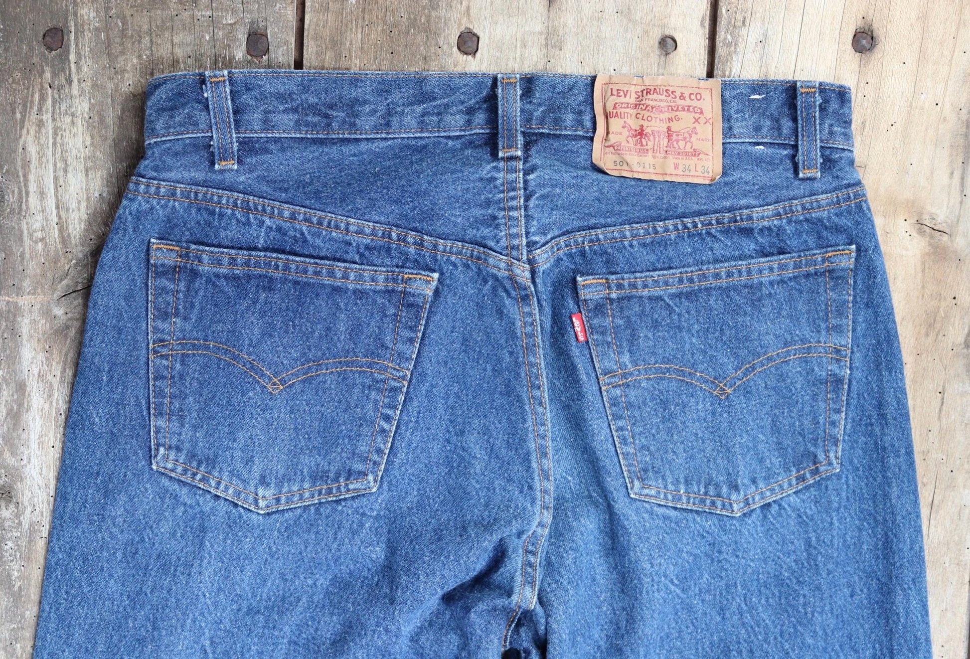 Vintage 1980s Levis 501 denim jeans - made in USA - small e red tab - 33” x 34”