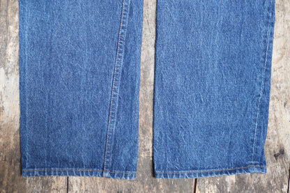 Vintage 1980s Levis 501 denim jeans - made in USA - small e red tab - 33” x 34”