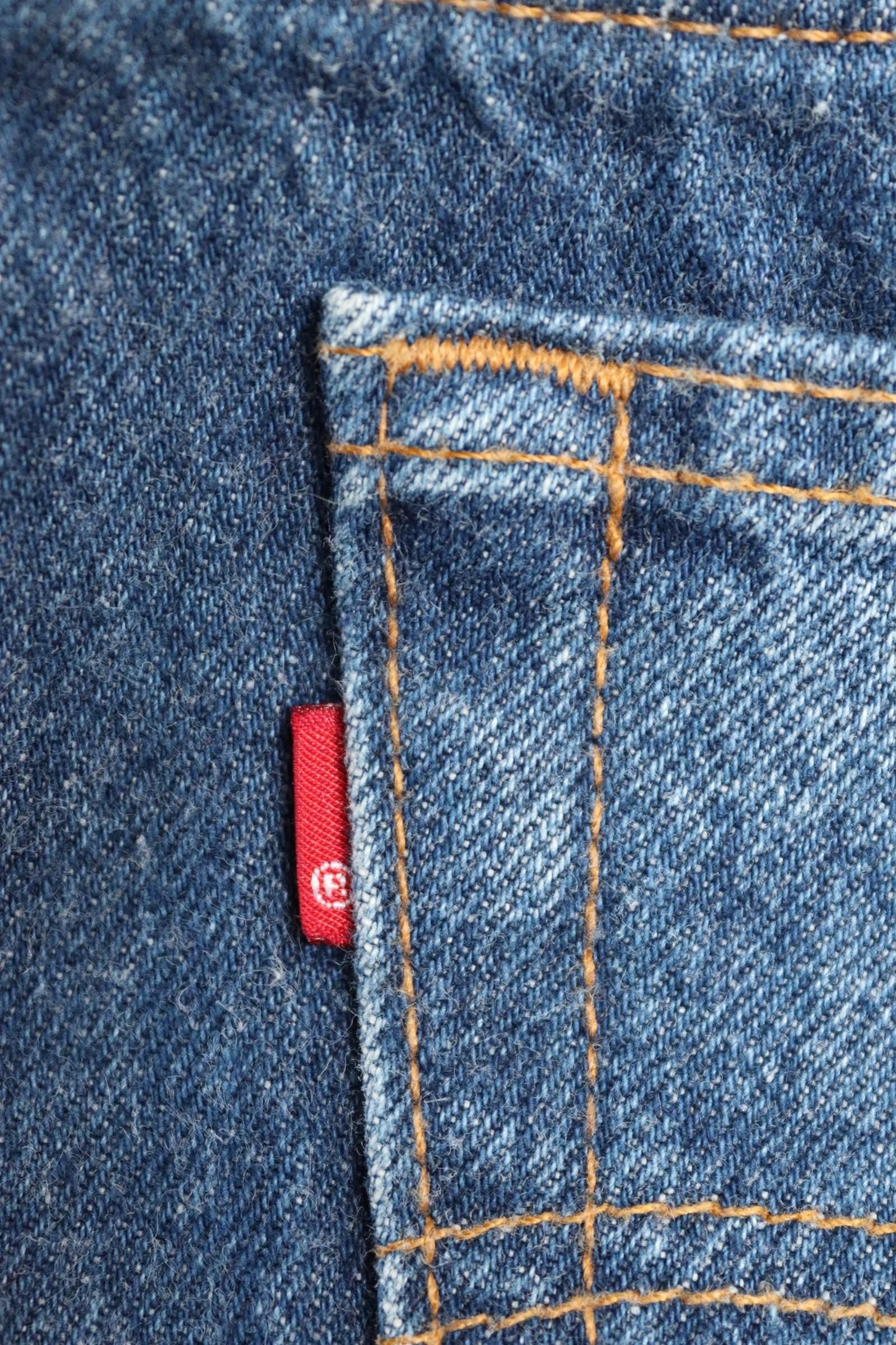 Vintage 1980s Levis 501 denim jeans - made in USA - small e red tab - 35” x 30”