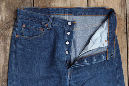 Vintage 1990s Levis 501 denim jeans - made in USA - small e red tab - 33” x 32”