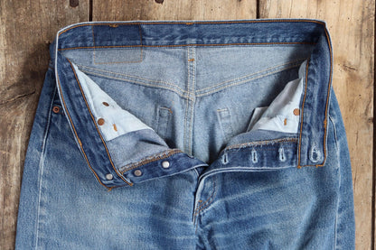 Vintage 1990s Levis 501 denim jeans - made in USA - small e red tab - 31” x 31”