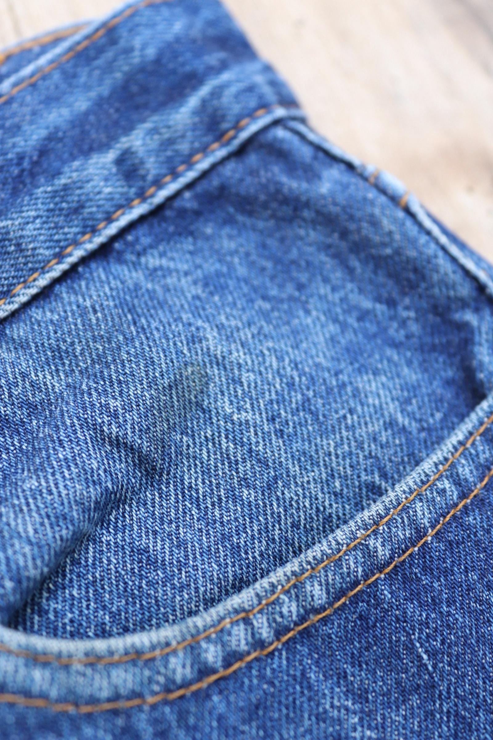 Vintage 1980s Levis 501 denim jeans - made in USA - small e red tab - 35” x 32”