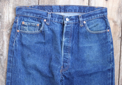 Vintage 1980s Levis 501 denim jeans - made in USA - small e red tab - 35” x 32”