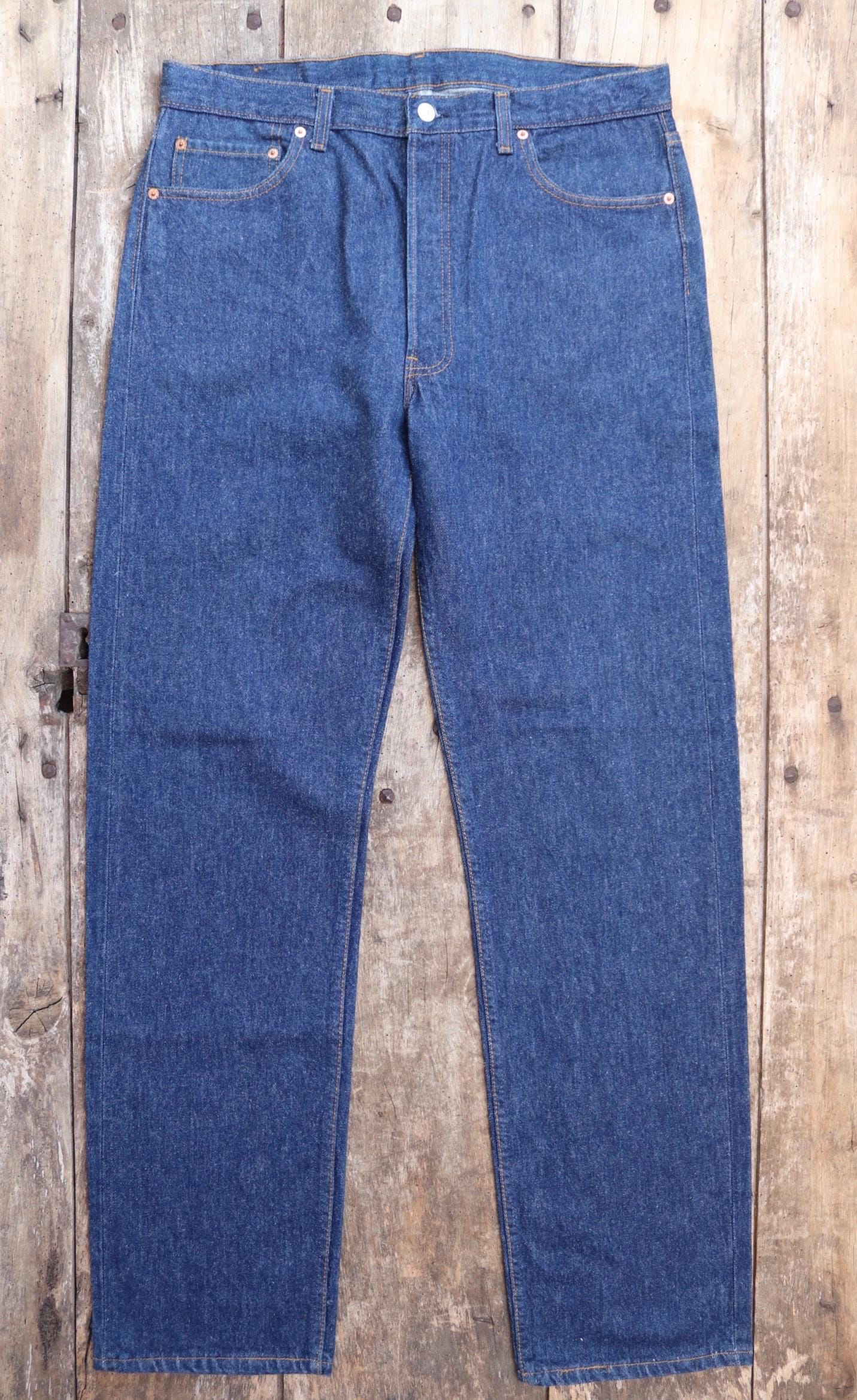 Vintage 1980s Levis 501 denim jeans - made in USA - small e red tab - 35” x 35”