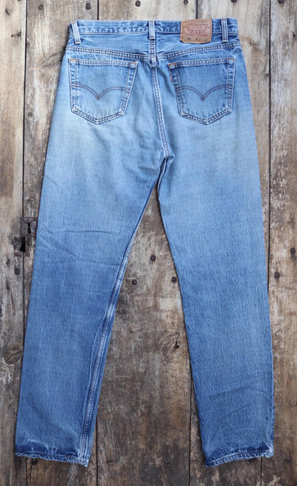 Vintage 1990s Levis 501 denim jeans - made in USA - small e red tab - 32” x 33”