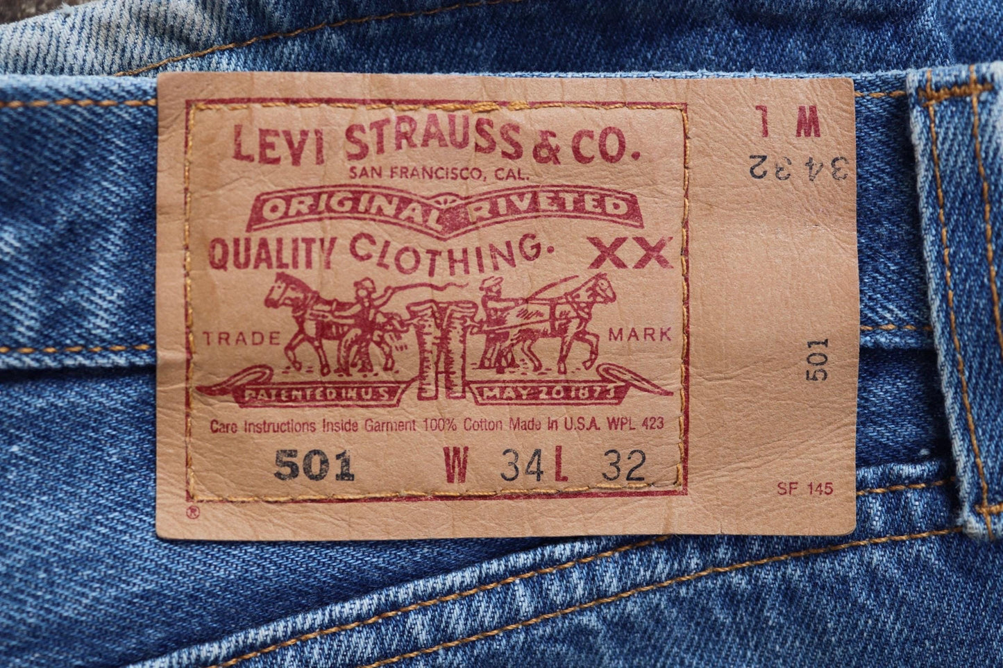 Vintage 1990s Levis 501 denim jeans - made in USA - small e red tab - 33” x 32”