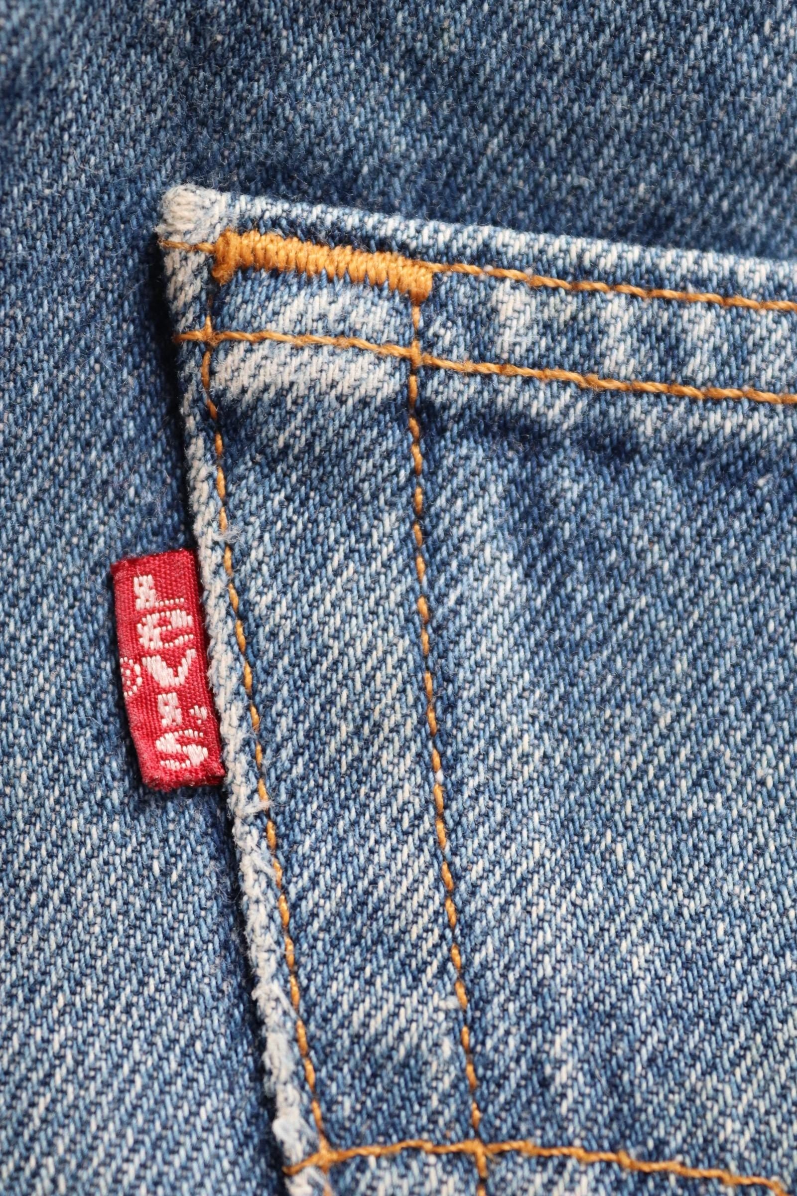 Vintage 1990s Levis 501 denim jeans - made in USA - small e red tab - 33” x 32”