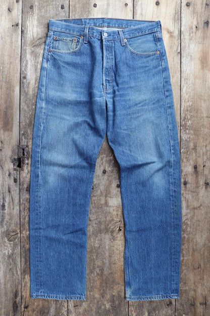 Vintage 1990s Levis 501 denim jeans - made in USA - small e red tab - 33” x 32”