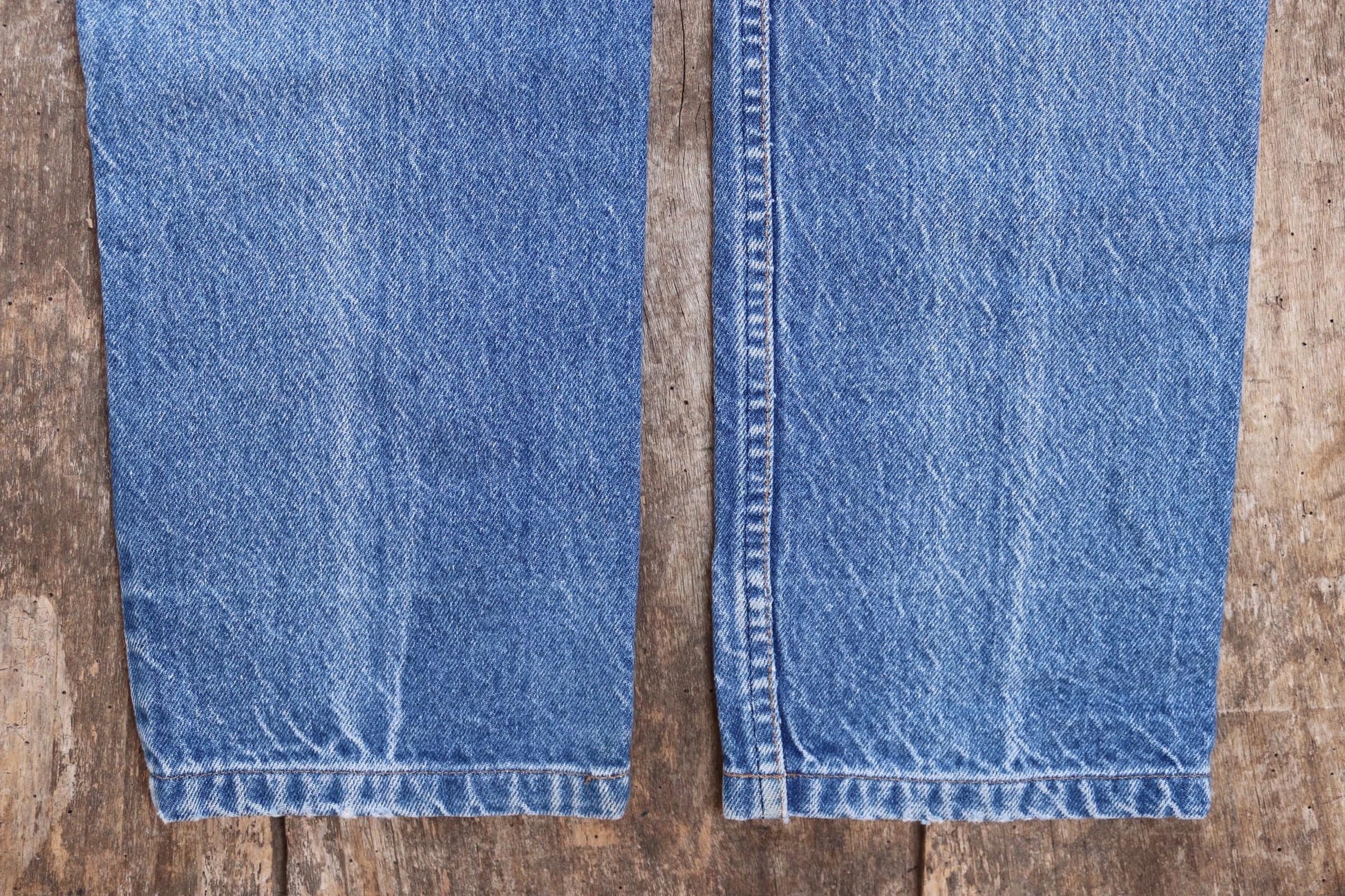 Vintage 1980s Levis 505 denim jeans - made in USA - small e red tab - 30” x 31”