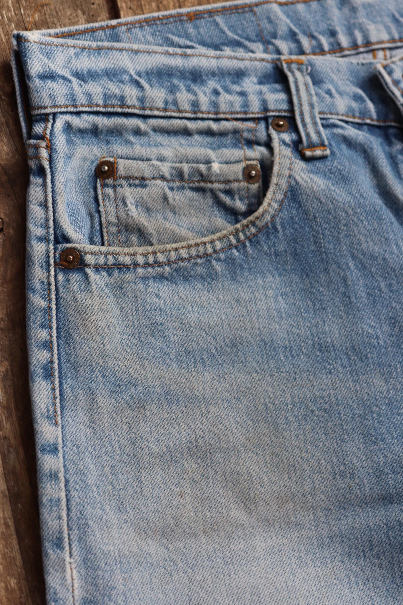 Vintage 1980s Levis 505 denim jeans - made in USA - small e red tab - 30” x 31”