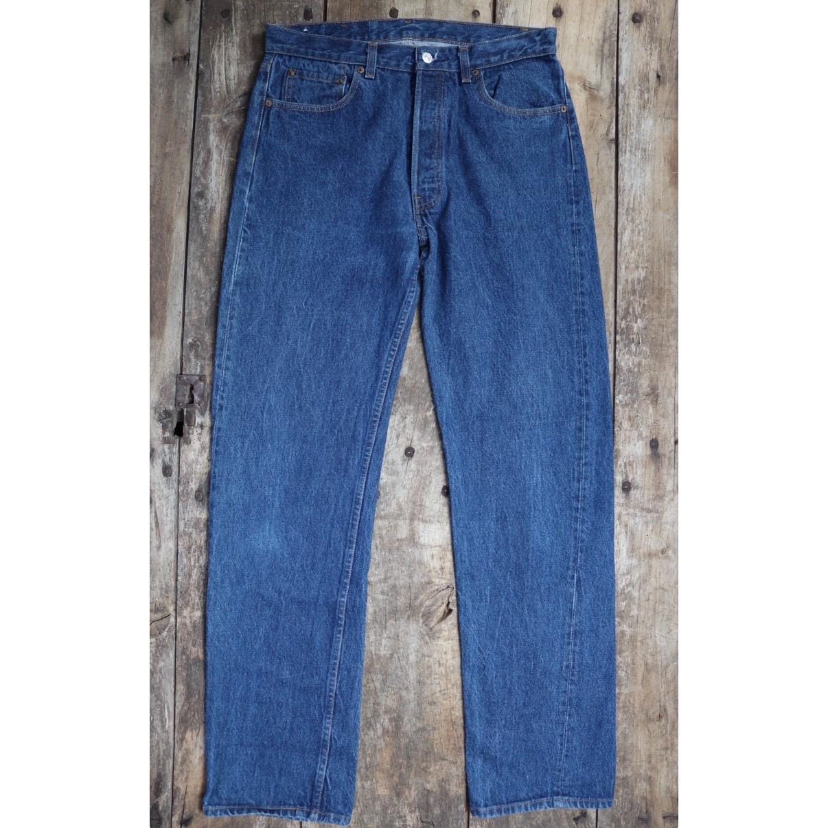 Vintage 1980s Levis 501 denim jeans - made in USA - small e red tab - 33” x 34”