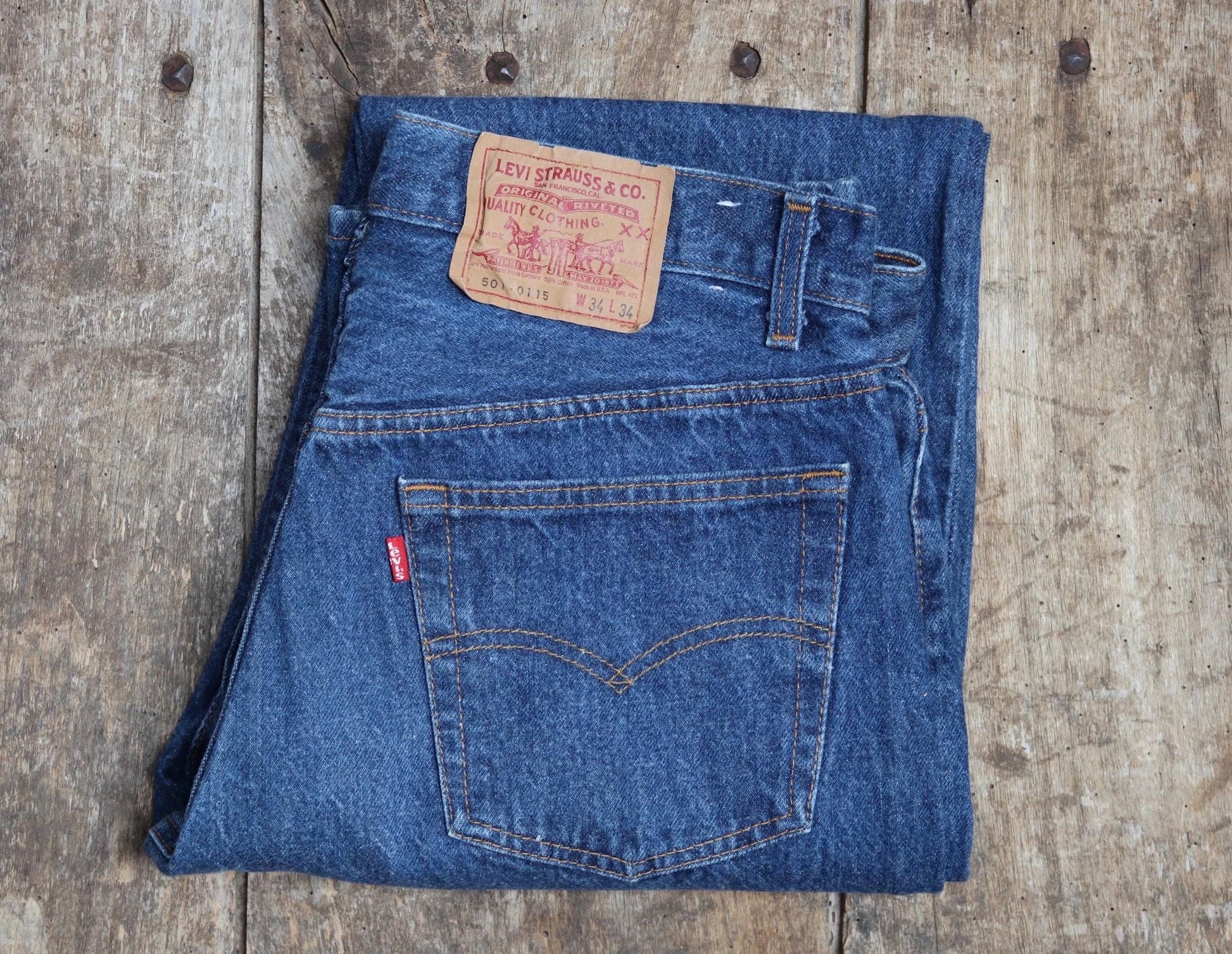 Vintage 1980s Levis 501 denim jeans - made in USA - small e red tab - 33” x 34”