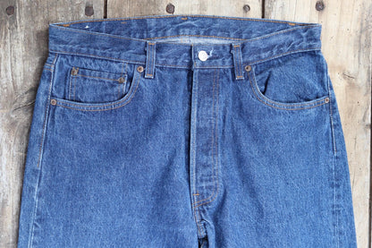 Vintage 1980s Levis 501 denim jeans - made in USA - small e red tab - 33” x 34”
