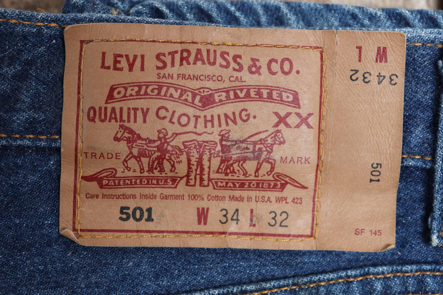 Vintage 1990s Levis 501 denim jeans - made in USA - small e red tab - 33” x 32”