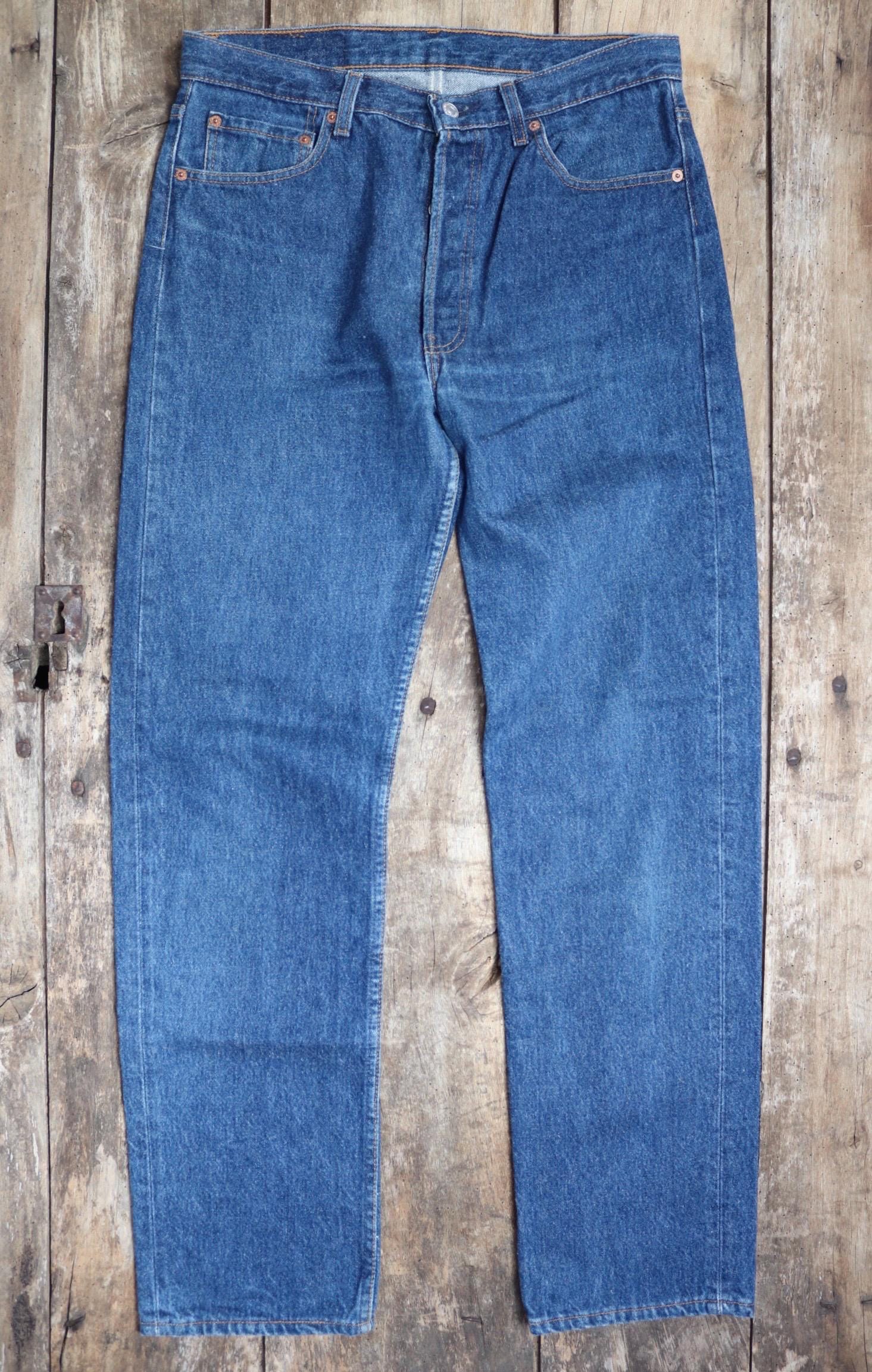 Vintage 1990s Levis 501 denim jeans - made in USA - small e red tab - 33” x 32”