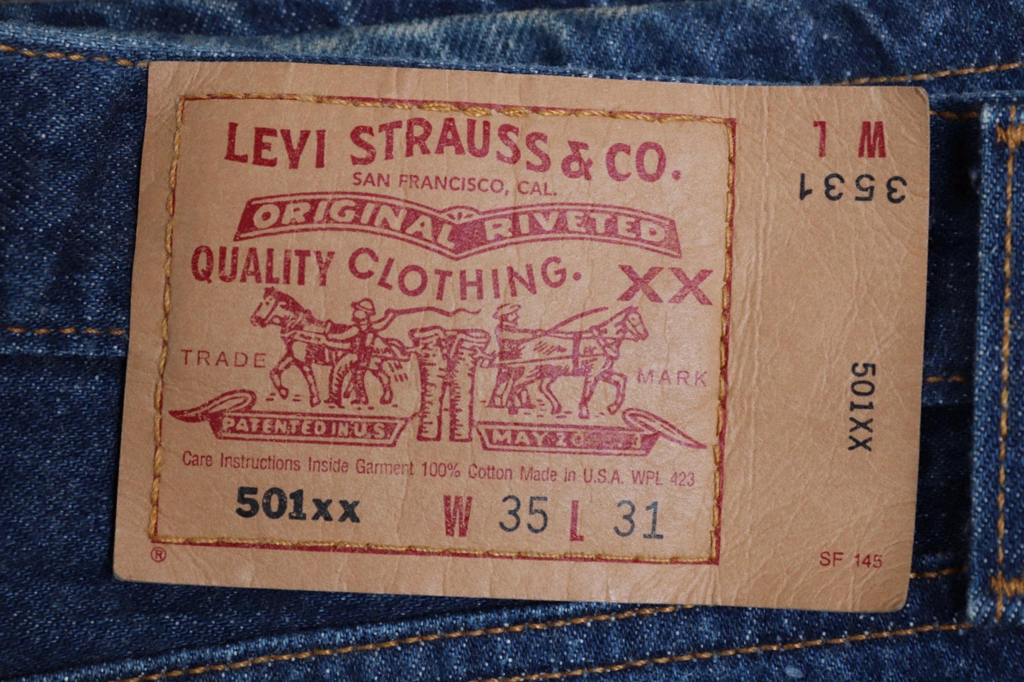 Vintage 1990s Levis 501xx denim jeans - made in USA - small e red tab - 34” x 29”