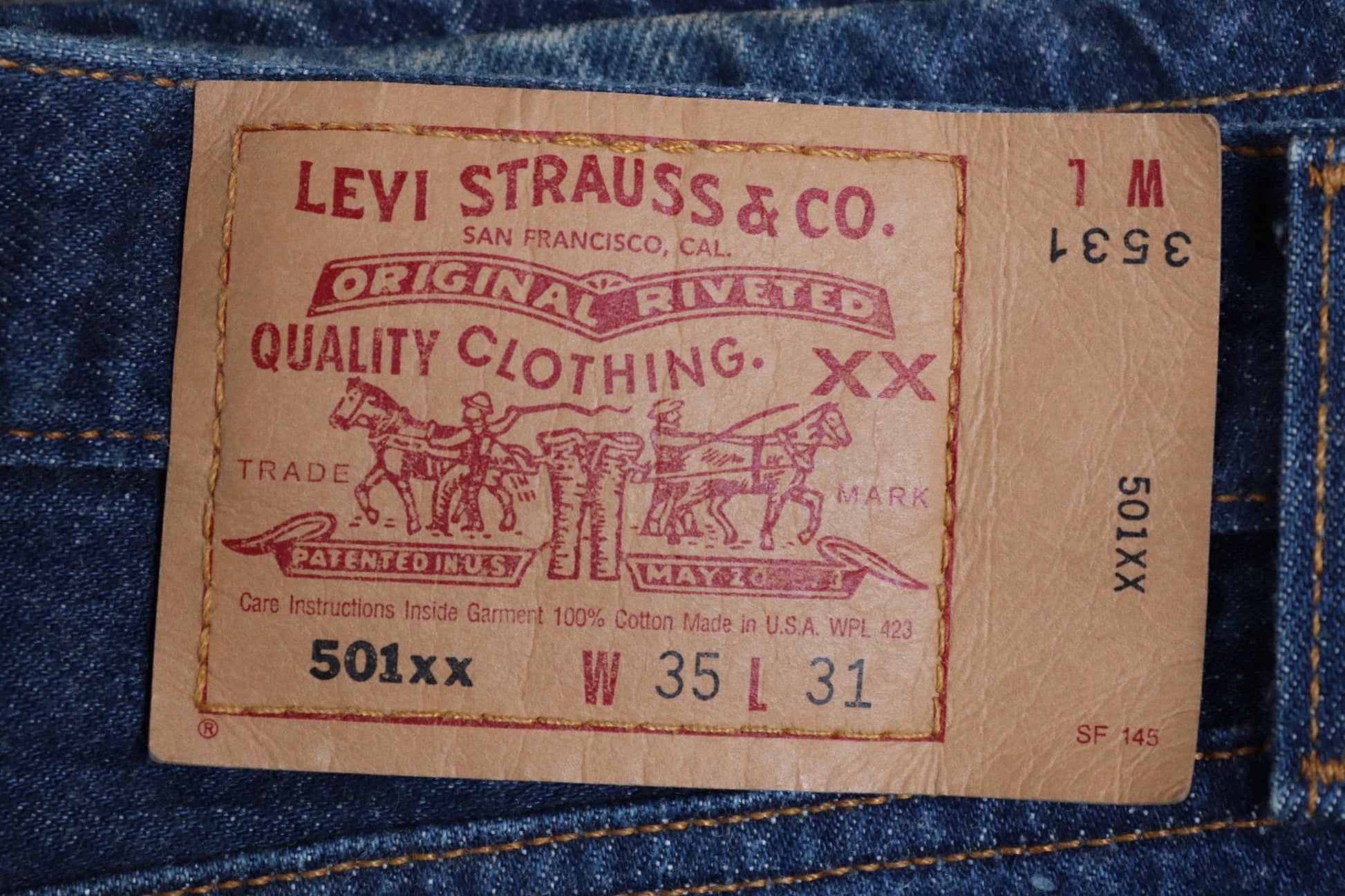 Vintage 1990s Levis 501xx denim jeans - made in USA - small e red tab - 34” x 29”