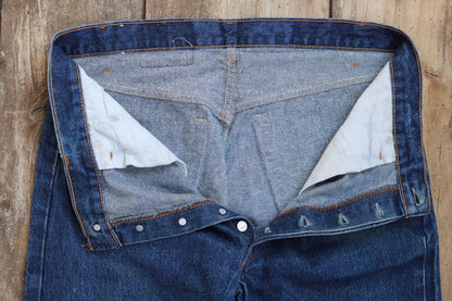 Vintage 1980s Levis 501 denim jeans - made in USA - small e red tab - 35” x 32”