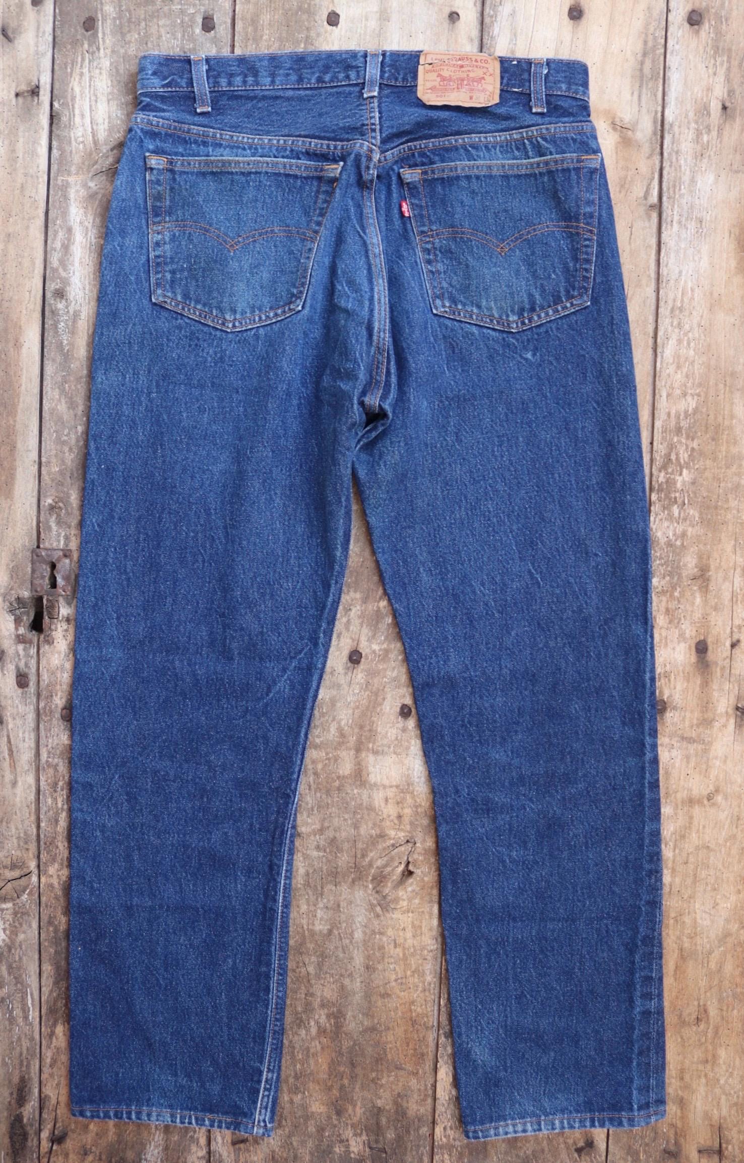 Vintage 1980s Levis 501 denim jeans - made in USA - small e red tab - 35” x 32”