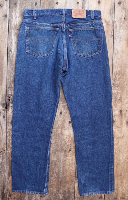 Vintage 1980s Levis 501 denim jeans - made in USA - small e red tab - 35” x 32”